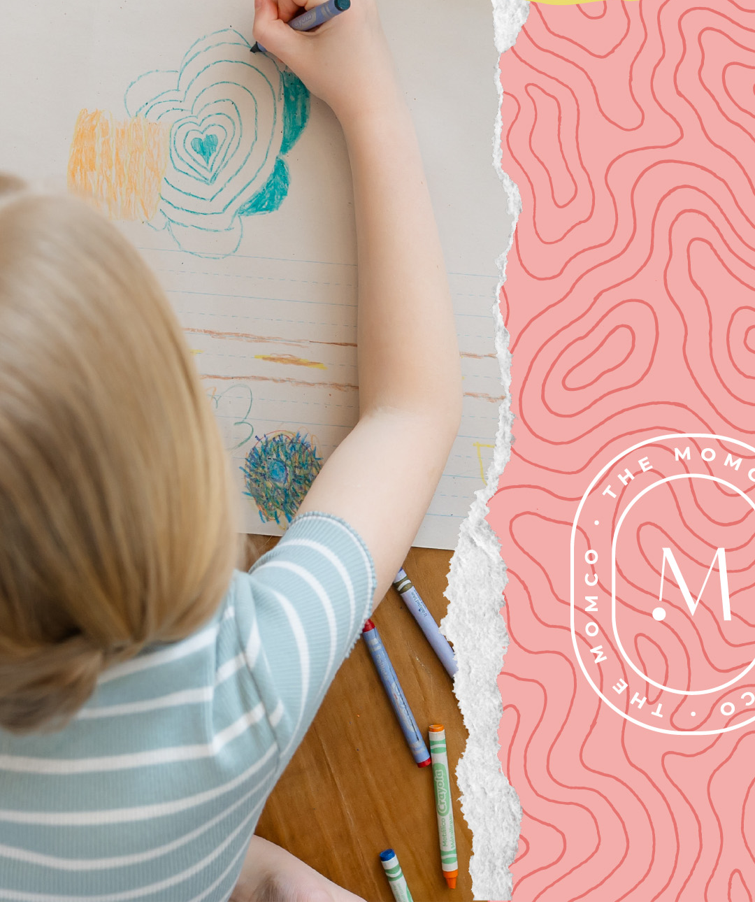 A child drawing with crayons
